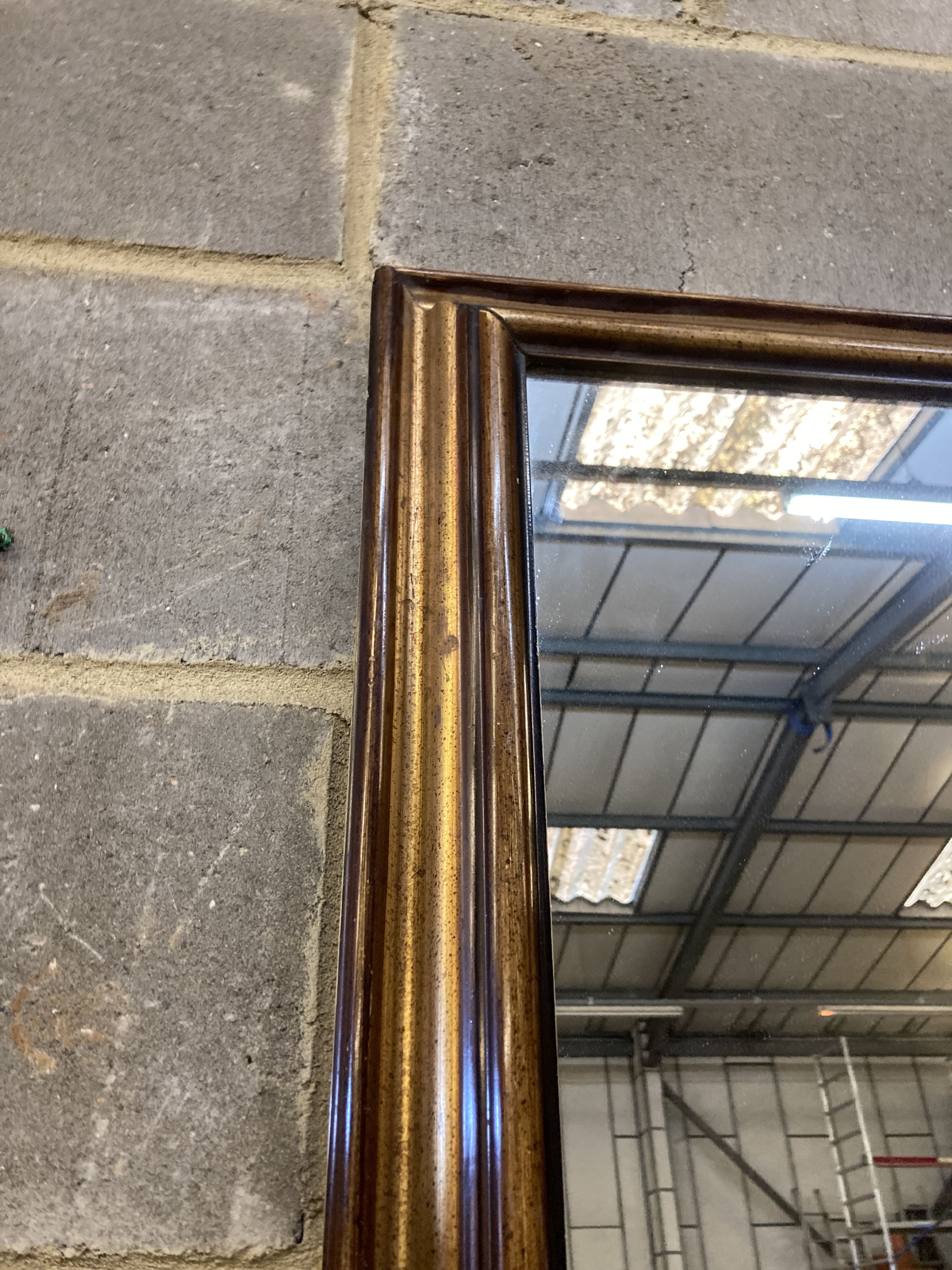 A large rectangular parcel gilt-framed wall mirror, width 140cm, height 230cm